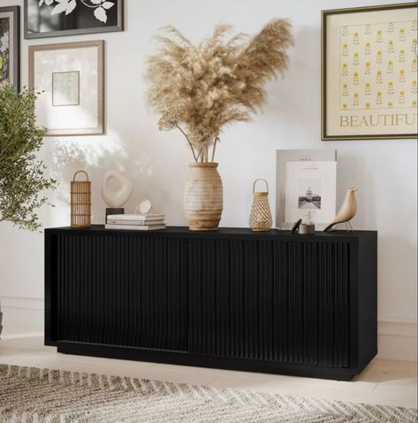 Love this affordable fluted tv stand. You won’t believe the price and 4.6 stars. Run on this deal. It won’t last Fluted tv stand / fluted cabinet/ modern furniture / black cabinet / walmart finds / target / drew Barrymore / toy storage Entertainment center / storage cabinet Follow my shop @blessedhouseofthree on the @shop.LTK app to shop this post and get my exclusive app-only content! #liketkit #LTKhome #LTKstyletip @shop.ltk https://liketk.it/4lQ05 Living Room Design Black, Fluted Tv Stand, Fluted Cabinet, Entertainment Center Storage, Tv Stand Decor Living Room, Stand For Tv, Storage Entertainment Center, Bedroom Tv Stand, Organic Living Room