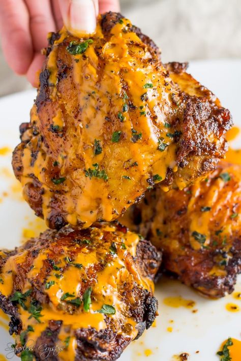 Baked or air fryer chicken thighs drizzled with buffalo sauce. This recipe is naturally healthy, low carb and keto at only 1g net carbs per serving. Extra crispy skin either way you cook these bad boys. A homemade spice rub that's packed with flavor and not too much heat so everyone in the family can enjoy this with dinner. Shredded Chicken Thigh Recipes, Keto Shredded Chicken, Buffalo Chicken Thighs, Homemade Spices, Buffalo Sauce, Chicken Dishes Recipes, Net Carbs, Chicken Thigh Recipes, Buffalo Chicken