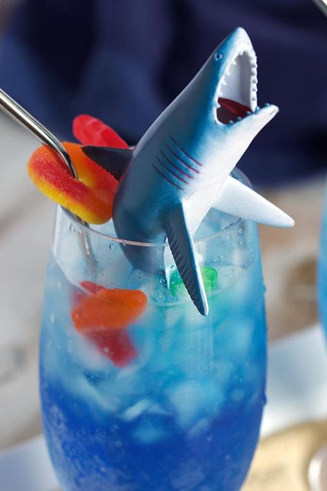 Shark Attack Cocktail - The Suburban Soapbox Shark Week Drinks, Shark Week Recipes, Shark Themed Birthday, Shark Week Party, Kid Friendly Drinks, Birthday Cocktail, Shark Themed Birthday Party, Shark Bait, Shark Cake