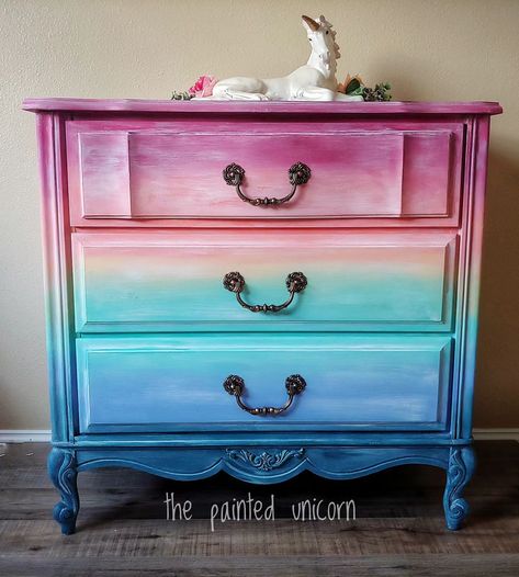 Does anybody remember this piece? I think it's time for a makeover as my daughter has done a number on it! 🫣 This was painted in all @diypaintbydebisdesigndiary with white wax. Still love this look! #furniturepainter #paintedfurniture #furnitureart #upcycledfurniture #chalkpaintedfurniture #handpainted #refinishedfurniture #designinspo #handpaintedfurniture #paintedfurniturelove #repurposedfurniture #restyledfurniture #furnitureartist #paintingfurniture #roomdesign #reimaginedpaintedfurnit... Pink Purple And Blue Dresser, Bright Colored Dresser, Rainbow Dresser, Funky Studio, Rainbow Furniture, Painted Unicorn, Girl Dresser, Hand Painted Dressers, Colorful Dresser