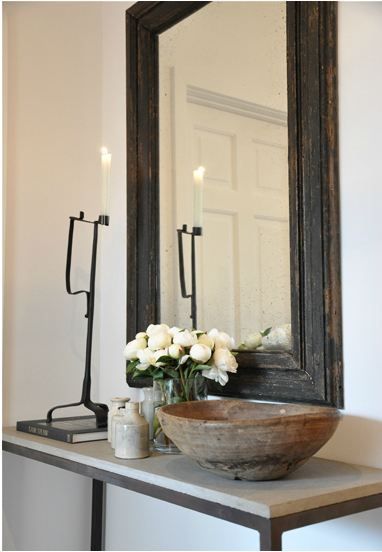 hand forged candle sticks & re-purposed frame on this console with out-of-round wooden bowl...excellent vignette.... Briggs Edward Solomon, Foto Tips, A Mirror, Simple Elegance, Cheap Home Decor, Scandinavian Style, Home Decor Accessories, Home Decor Inspiration, Interior Spaces