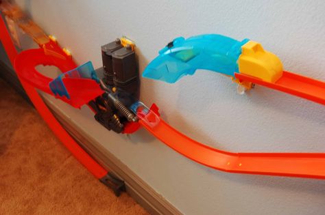 Hot Wheels Wall Tracks Review Hot Wheels Cars Storage, Hotwheels Track, Hot Wheels Wall Tracks, Car Themed Rooms, Hot Wheels Wall, Hot Wheels Track, Organized Mom, Space Room, Hot Wheels Cars