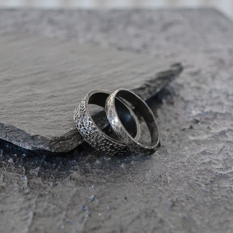 We designed this oxidized silver matching hand-forged Viking wedding band set for Pagan, medieval, and Nordic style lover couples. You can choose these rings to make them feel that you are one with the person you love. You can use our ring on your engagement, wedding, promise, or anniversaries, or you can use it as a stacking ring by wearing it together. These rings, which we make handmade from 925 sterling silver, have two color options (silver or oxidized silver). We make it in our workshop in Viking Wedding Rings His And Hers, Wedding Rings Couple Silver, Pagan Wedding Rings, Matching Engagement Rings, Nordic Rings, Viking Wedding Band, Norse Wedding, Nordic Ring, Medieval Wedding Ring