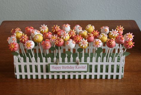 Vanilla cake pops with candy melt coating and fondant flowers made for a first birthday. The base was styrofoam, but I would love to try it with cake next time.  :-)  TFL! Vanilla Cake Pop Recipe, Flower Cake Pops, Cake Pop Bouquet, Cake Pop Displays, Cake Pop Designs, Cake Pop Decorating, Pop Cupcakes, Cake Pop Stands, Garden Cakes