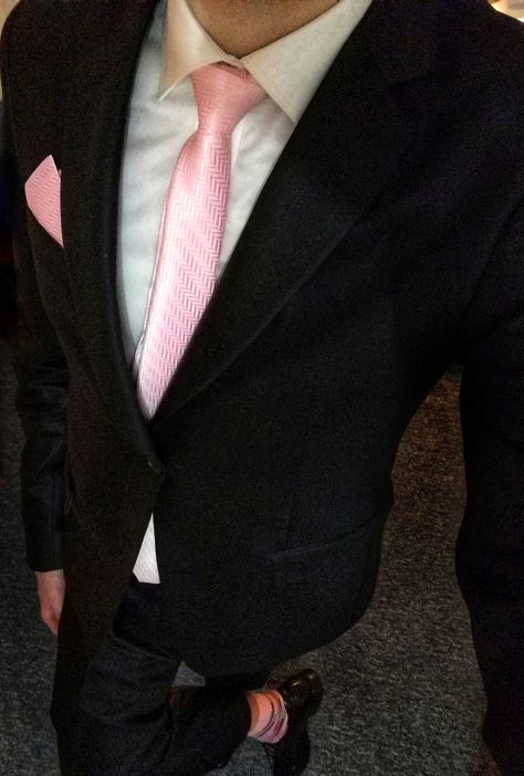 Black Tuxedo With Pink Shirt Men, Pink Tie Suit Men, Black Suit Pink Pocket Square, Black And Pink Formal Outfit Men, Pink Groomsman Suit, Pink Tie With Suit, Black Tux With Light Pink Tie, All Black Suit With Pink Bow Tie, Black Suit And Pink Tie