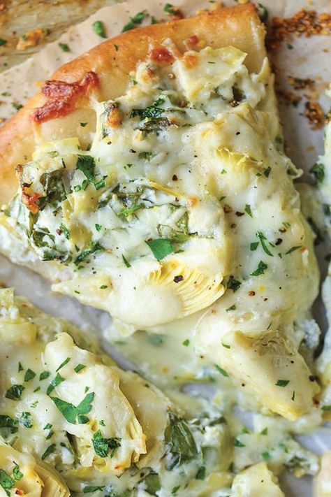 35 Pizza Topping Ideas That Are Way More Exciting Than Plain Ol' Pepperoni #purewow #pizza #dinner #cooking #recipe #family #food Artichoke Dip Pizza, Pizza Stromboli, Creative Pizza, Spinach And Artichoke Dip, Pizza Roll, Four A Pizza, Naan Pizza, Artichoke Recipes, Pizza Recipes Homemade