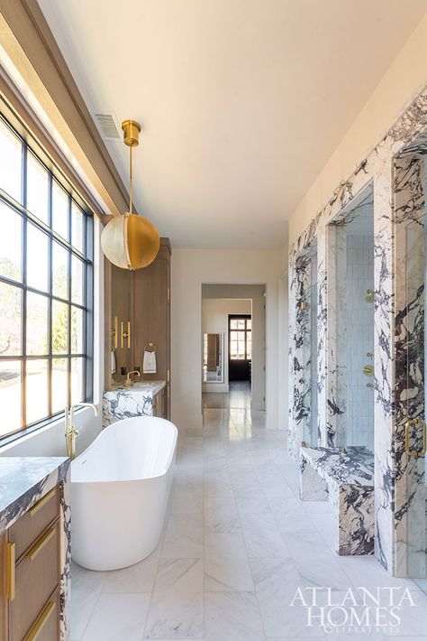 While bathtubs usually snag the starring role, it’s a marble-encased shower that steals the show in this Atlanta bathroom by Studio Entourage. Tub With Ledge, Marble Bath Tub, Standalone Tub, Atlanta Homes And Lifestyles, Marble Tub, New House Bathroom, Stand Alone Tub, Harrison Design, Bathroom Retreat