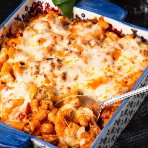 Baked Penne alla Vodka with sausage and ricotta with an amazing sauce is going to be your new best friend. It starts out on the stove and ends up in the oven. #butterandbaggage #pasta #casserole Vodka Pasta With Sausage, Baked Pasta With Sausage And Ricotta, Pasta Arrabiata With Sausage, Cheesy Baked Pasta With Sausage And Ricotta, Rigatoni Alla Vodka With Sausage, Penne Alla Vodka With Sausage, Vodka Penne Pasta, Penne Vodka Sauce, Penne Vodka