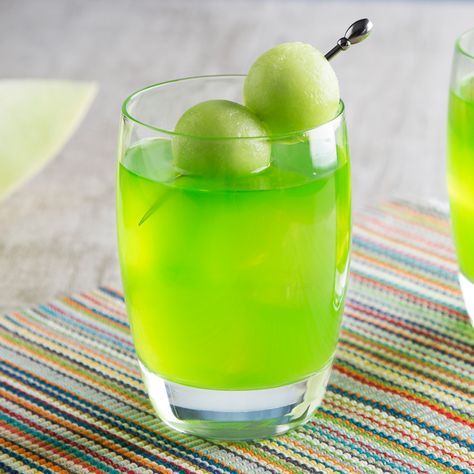 The Midori® Melon Ball is a Midori® Melon Drink combined with vodka and topped with orange juice, for layered, aesthetically pleasing drink that also packs a punch. Find this simple, but tasty recipe at The Cocktail Project. Melon Drink Recipes, Melon Ball Drink, Melon Ball Cocktail, Melon Drink, Fruit Infused Vodka, Midori Drinks, Midori Melon, Citrus Vodka, Melon Liqueur