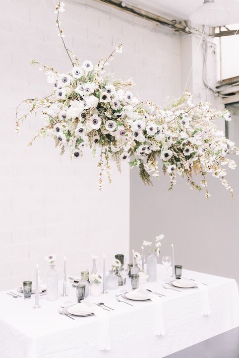 Hanging installations in weddings is a trend we picked up on a few years ago and now we'd venture to say it's a new classic. Get inspired here! The Ceiling, White Flowers, Ceiling, Weddings, Black And White, Flowers, Floral, White, Black