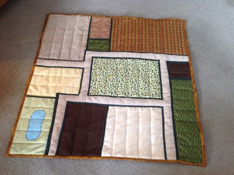 Quilted farm playmat I made for my grandson, using scraps of fabric. I quilted in different directions to get the idea of fields and furrows. Quilted Farm Play Mat, Farm Playroom, Quilted Playmat, Farm Play Mat, K4 Classroom, Play Mat Diy, Quilted Play Mat, Car Activity, Tractor Quilt