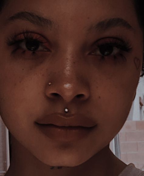 Medusa Lip Piercing Black Women, Nostril Piercing Black Woman, Madussa Piercing, Medusa And Ashley Piercing, Medusa Piercing Black Women, Piercings On Black Women, Cheek Dermal Piercing, Piercing Ideas Black Women, Medusa Piercing Aesthetic