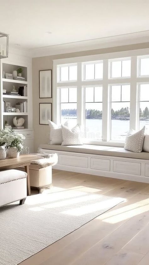 This serene reading nook features a window seat with soft cushions and a stunning view of the ocean, inviting relaxation royalty free stock images Diy Window Seat Living Room, Bay Window With Seat, Window With Seating Area, Living Room Window Bench, Living Room With Lots Of Windows, Nursery Window Seat, Small Reading Nook Cozy Corner, Bay Window Reading Nook, Window Seat Living Room