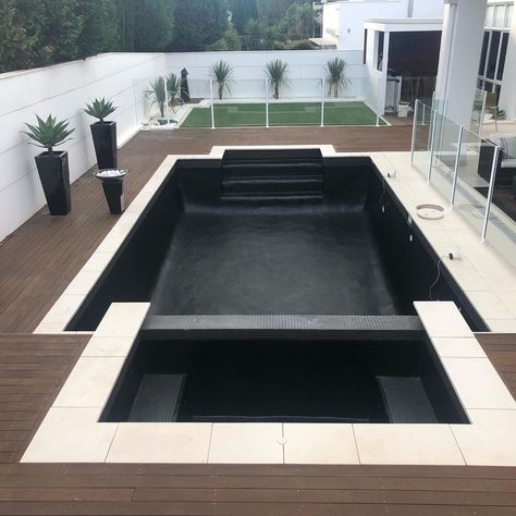 You can create an on-trend black pool interior using LUXAPOOL Epoxy swimming pool paint in Black.  LUXAPOOL Epoxy pool paints can be used on marblesheen, pebblecrete, previously painted pools, fibreglass and cement pool surfaces. For further ideas on pool colours visit our Pool Gallery Black Bottom Pools, Cement Pools, Moderne Pools, Pool Paint, Pools Backyard Inground, Swimming Pool Architecture, Pool Finishes, Swimming Pool Landscaping, Pool Colors