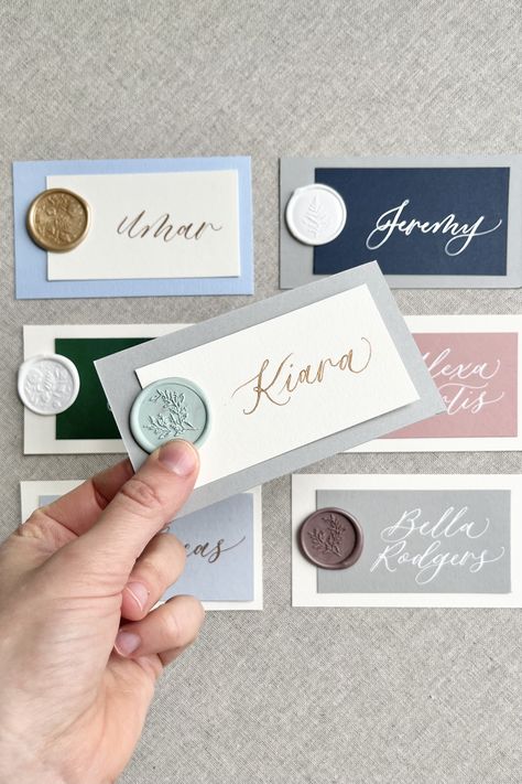 Personalized, calligraphed place cards/escort flat layered cards with a wax seal perfect for weddings, events, or dinner parties! Every card is handwritten in your choice of ink color on your choice of 2 cardstock colors in Letter B Calligraphy's signature modern calligraphy style. Placecards Wax Seal, Wax Seal Name Cards, Placecards Wedding Wax Seal, Wax Stamp Place Cards, Wax Seal Ideas, Wedding Name Place Cards Wax Stamp, B Calligraphy, Diy Place Cards, Wedding Name Cards