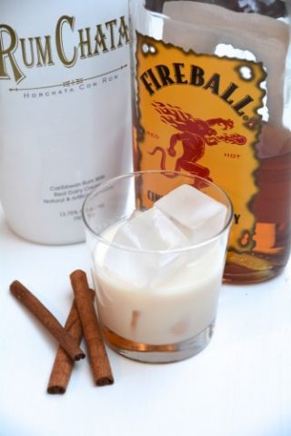 If you’re looking for a new Fireball Whisky recipe to try, look no further. Mixing Fireball with the creamy RumChata liqueur is one drink you absolutely have... Fireball And Rumchata, Rumchata And Fireball, Cinnamon Toast Crunch Shot, Fireball Cocktails, Fireball Drinks, Rum Chata, Fireball Whiskey, Fall Cocktails Recipes, Rum Balls