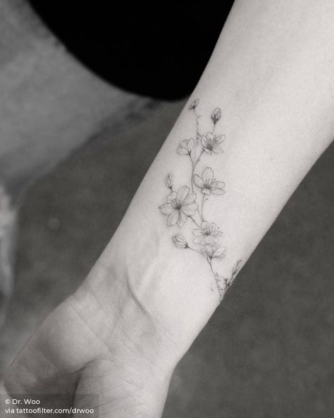 Wrap Around Wrist Tattoos, Wrap Around Tattoo, Sakura Tattoo, Forearm Flower Tattoo, Dr Woo, Inner Forearm Tattoo, Flower Wrist Tattoos, Small Forearm Tattoos, Single Needle Tattoo