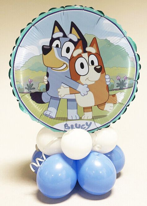 Inflated Bluey Balloon Table Centrepiece COMES INFLATED Description A fantastic fun Bluey balloon centrepiece, perfect for a kids birthday party. This foil balloon centrepiece comes fully inflated and assembled. This includes a Bluey and Bingo design round foil balloon that is attached to a blue and white 10 balloon base. This centrepiece measures approximately 53 cm. Once inflated the balloon will last approximately 7 days. About Struts Based in Carlisle, Cumbria we have over 25 years experience in making sure that your big night is one to remember! We stock a massive range of fancy dress costumes, accessories and party supplies and pride ourselves on excellent customer service, fast dispatch and quick, affordable delivery. Payment We accept payment via PayPal. Delivery We deliver Worldwi Bluey Birthday Balloons, Bluey Centerpiece Ideas, Balloon Centrepiece, Balloon Base, Bingo Design, Balloon Table Centerpieces, Carlisle Cumbria, Bluey Party, Table Centerpieces Diy