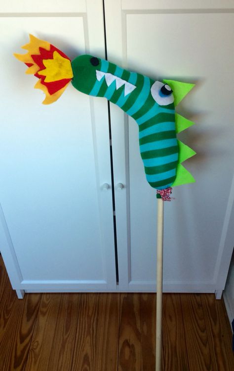 DIY no-sew sock and felt stick dragon Glove Monsters, 2024 Ideas, Sock Crafts, Dragon Party, Daycare Ideas, A Stick, Making Out, Wind Sock, Baby Mobile