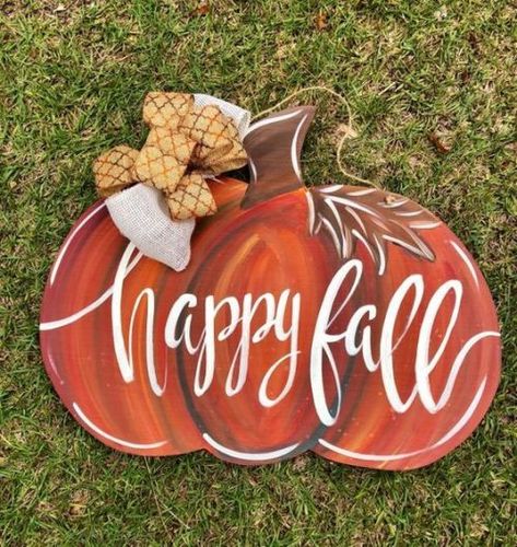 10 DIY Wooden Pumpkin Ideas You'll Love For Fall - Society19 Pumpkin Signs Wooden Painted, Wood Pumpkin Painting Ideas, Pumpkin Diy Decor, Pumpkin Signs, Pumpkin Diy, Fall Wood Crafts, Fall Door Hanger, Pumpkin Door Hanger, Painted Pumpkin