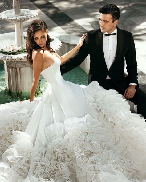 This voluminous Dovita wedding dress features a dramatic princess skirt bathed in dramatic frills allover with a detachable ruffle neckline. April Wedding Dress, Pure White Wedding, Big Wedding Dresses, Elegant White Dress, Bridal Gowns Vintage, White Wedding Gowns, Ruffle Wedding Dress, Bridal Dresses Lace, Princess Wedding Dress