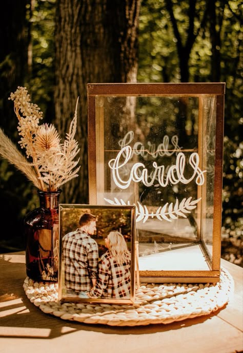 Boho Gift Table Ideas, Wedding Centerpieces Pictures Of Couple, Wish You Were Here Wedding Table, Fall Wedding Reception Ideas Indoor, Wedding Card Table Ideas, Check In Table, Rustic Wedding Gift Table, Black Rustic Wedding, Wedding Entry Table