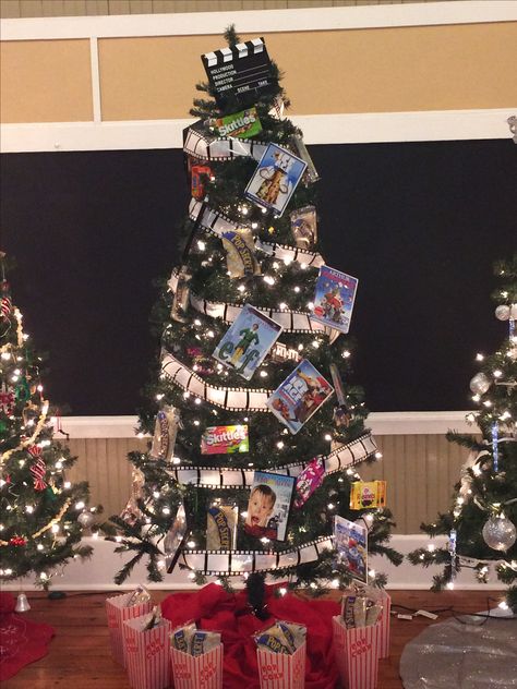 Christmas Story Theme Tree, Christmas Movie Tree Themes, Office Christmas Tree Themes, Broadway Christmas Tree, The Office Themed Christmas Tree, Movie Theater Christmas Tree, Movie Themed Christmas Tree Ideas, Movie Theme Christmas Tree, Christmas Movie Decorations