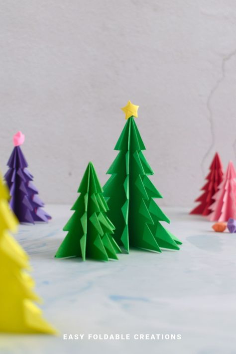 3D Origami Christmas Tree | Easy Foldable Creations Origami Christmas Tree Decorations, Simple Christmas Origami, Christmas Tree Origami Easy, Origami Trees Christmas, Christmas Origami Tutorial, 3d Christmas Tree Craft, Oragami Christmas Tree, Christmas Origami Easy, Folding Paper Crafts