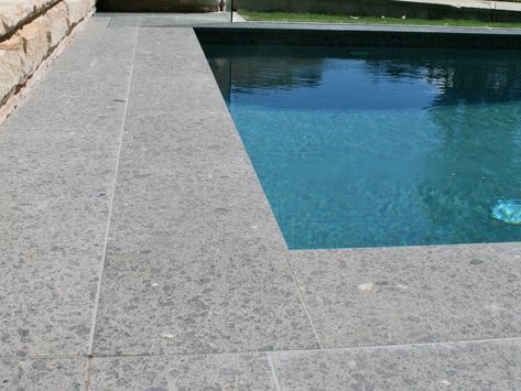 Eco Outdoor Torino granite pool coping. Eco Outdoor | Contemporary Pools | Granite paving | livelifeoutdoors | Outdoor Design | Natural stone flooring | Garden design | Outdoor paving | Outdoor design inspiration | Outdoor style | Outdoor ideas | Paving ideas | Garden ideas | Natural stone paving | Floor tiles | Outdoor tiles | Pool ideas Pool Tiles Ideas, Pool Coping Ideas, Grey Pool, Front Door Landscaping, Pool Paving, Eco Outdoor, Granite Paving, Pool Pavers, Outdoors Style