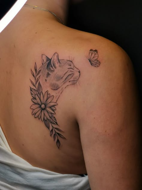 Cat memorial tattoo, with flowwr and butterflies Pet Tribute Tattoo Cat, Cat Shoulder Tattoo, Cat Name Tattoo, Dead Cat Tattoo, Tattoos For Cats That Passed, Pet Memorial Tattoo Cat, Cat Tattoo Memorial, Angel Cat Tattoo, Cat Remembrance Tattoo