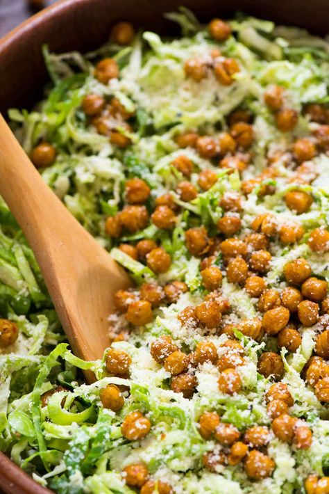 Shaved Brussels Sprouts Salad {With Caesar Dressing!} – WellPlated.com Brussel Sprouts Salad, Chickpea Croutons, Crispy Roasted Chickpeas, Shaved Brussel Sprout Salad, Crispy Chickpea, Brussel Sprout Salad Recipes, Fried Brussel Sprouts, Shaved Brussel Sprouts, Roasted Chickpea