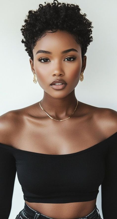 Experience trendy and textured short haircuts for black women that celebrate natural hair. These styles enhance your curl pattern and add dimension. From defined coils to voluminous crops, find a cut that showcases your hair's natural beauty and keeps you looking fresh. Natural Hair Tapered Haircut Black Women, Medium Short Hair Black Women, Pixie Afro Haircut, Short Curly Haircut Black Women, Tampered Short Natural Hair, Short Afros For Women Natural Hair, Curly Mushroom Haircut Black Women, Twa Growing Out Stages, Black Woman Tapered Haircut