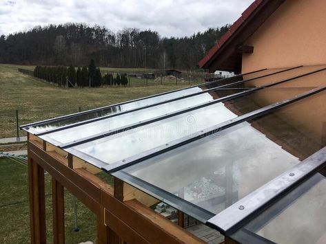 The detail of the transparent glass roof of the wooden pergola. royalty free stock photography Glass Pergola Roofs, Glass Roof Detail, House Image, Wooden Pergola, The Modern House, Pergola With Roof, Covered Pergola, Wood Structure, Glass Roof