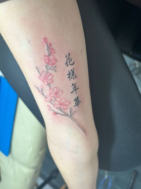 #bts #tattoo Chinese Tattoo With Flower, Arm Tattoo Cherry Blossom, Chinese Style Tattoo For Women, Chinese Rose Tattoo, Fine Line Tattoo Cherry Blossom, Chinese Blossom Tattoo, Chinese Flowers Tattoo, Sakura Tattoo Ideas, Bts Flower Tattoo