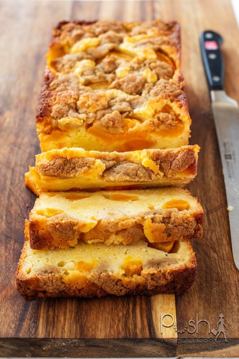 National Peach Cobbler Day: a Peach Cobbler Pound Cake Recipe your Family will Love Peach Butter Cake Recipe, Recipes With Pound Cake In Them, Angel Food Peach Cake, Peaches And Cream Loaf 12 Tomatoes, Peach Loaf Cake Recipes, Peaches And Cream Loaf Cake, Sour Cream Peach Pound Cake, Peach Breakfast Cake, Peach Cobbler Loaf Cake