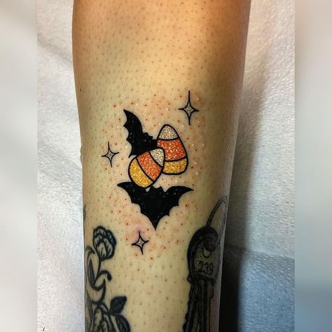 Pumpkin Tattoo On Knee, Haunt Me Tattoo, Eye Candy Tattoo Idea, Glitter Bat Tattoo, Candy Corn Tattoo Halloween, Cute Glitter Tattoo, Halloween Glitter Tattoo, Spooky Glitter Tattoo, Traditional Halloween Pinup Tattoo