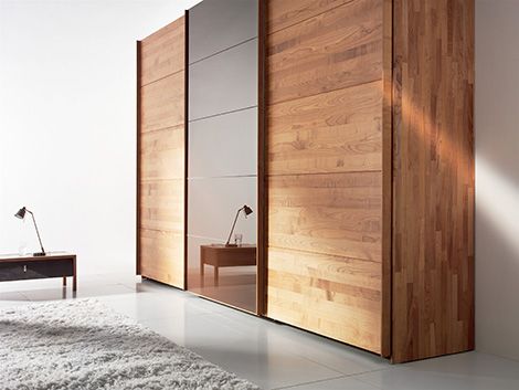 Solid Wood Wardrobe by Team 7 - Valore sliding door wardrobes are 'green' Sliding Door Wardrobe Designs, Bedroom Closet Doors, Solid Wood Wardrobes, Paneled Walls, Dressing Design, Modern Sliding Doors, Bedroom Cupboards, Wardrobe Door Designs, Sliding Wardrobe Doors