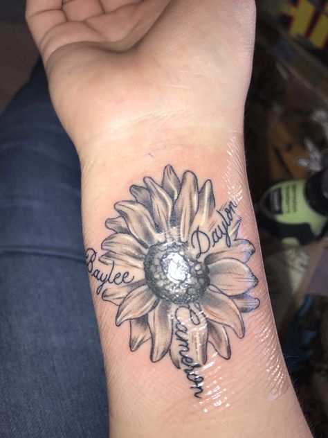 Sunflower With Name Tattoo, Children Tattoo, Name Flower Tattoo, Gator Football, Son Tattoos, Daisy Flower Tattoos, Mother Son Tattoos, Unique Tattoos For Women, Sunflower Tattoo Shoulder