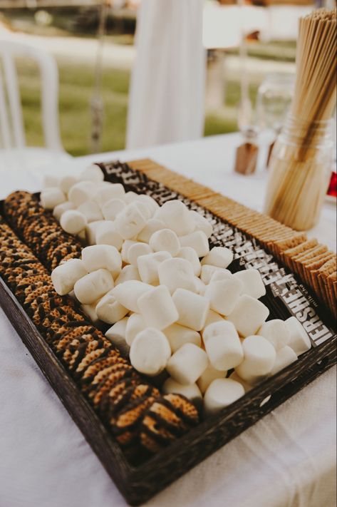 Smores Table Wedding Fire Pits, Western Smores Bar, S'mores Bar Set Up, Wedding Marshmallow Station, Best Foods For Wedding Reception, Outdoor Smores Bar Party, Boho Smores Bar, Winter Wedding Snack Bar, S’mores Stand Wedding