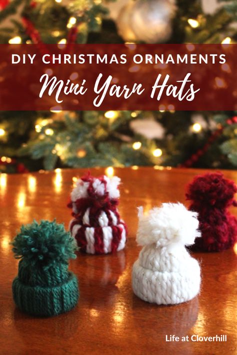 Mini Yarn Hat Christmas Ornaments - Life at Cloverhill Mini Winter Hat Tree Ornament, How To Make Mini Yarn Hats, Tiny Knit Hat Ornament, Mini Beanie Hats, Snowman Hat Ornaments Diy, Yarn Winter Hat Ornaments, Yarn Toque Ornament, Christmas Yarn Hat, Mini Winter Hats Diy