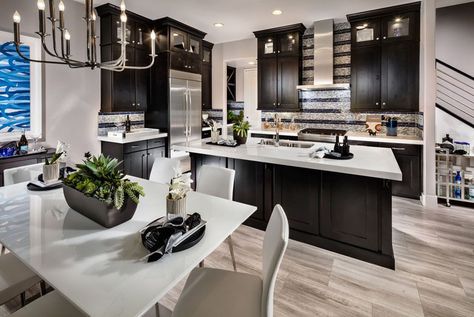 dark-cabinet-kitchen-with-white-super-thassos-glass-countertop-and-light-wood-floors Butterscotch Glaze, Traditional Kitchens, Dark Wood Kitchens, Light Wood Cabinets, Glass Countertops, Light Wood Floors, Dark Kitchen, New Kitchen Cabinets, Wood Kitchen Cabinets