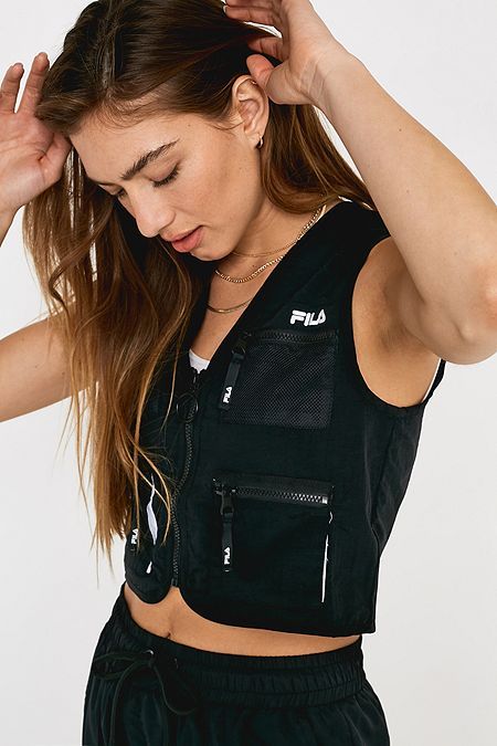 FILA Greist Black Utility Vest Utility Vest Women, Vest Outfit Streetwear, Cargo Vest Outfits For Women, Utility Vest Outfit Streetwear, Utility Vest Outfits For Women, Gilet Outfit Women, Utility Vest Outfit, Utility Fashion, Vest Outfits Men