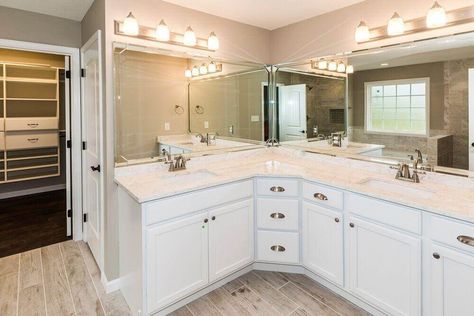 White and Cream Bathroom with Attached Closet Bathrooms With Corner Vanities, White Corner Vanity Bathroom, L Shaped Bathroom Counter, Double Corner Vanity Bathroom, L Shape Master Bath Vanity, Bathroom L Shaped Vanity, L Shaped Bathroom Vanity Double Sinks, Double Sinks In Bathroom, L Shape Bathroom Vanity Master Bath