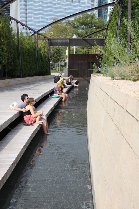 Wooden seating along a linear water feature in Chicago. Photo by David Verespy, RSDG Water Feature With Seating, Public Park Design, Public Garden Design, Wooden Seating, Terraced Landscaping, Water Architecture, Linear Park, Wood Architecture, Water Projects