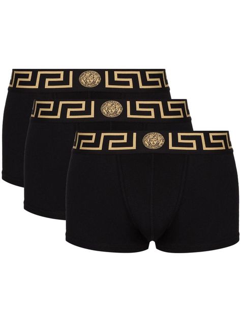 logo-waistband set of three boxer shorts They say ‘Knowledge is like underwear. It is useful to have it, but not necessary to show it off.’ They couldn`t be so wrong. These black boxer shorts from Versace prove otherwise. We believe everyone should see them. Yes, especially your closet. Made in Italy Washing instructions Hand Wash Brand style ID: AU10326A232741Gender: MenMaterial: PolyesterColor: BlackMade in: ITProduct ID: AU10326A232741*Import tax/duty will be calculated at checkout (If applic Designer Boxers, Boxer For Men, Versace Shorts, Matching Pairs, Men Boxers, Versace Logo, Medusa Head, Cotton Logo, Versace Men