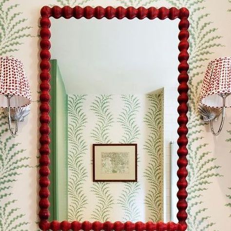 Alfred Newall on Instagram: "Cheerful red bobbin mirror in beautiful bathroom by @thenookinteriordesign   In good company with @soanebritain wallpaper @jimlawrencemade lighting @mollymahonblockprinting lampshades.  Photo: @the_london_gentleman" In Good Company, Power Room, March 16, Beautiful Bathrooms, Good Company, Lampshades, Interior Decorating, Mirror, Lighting