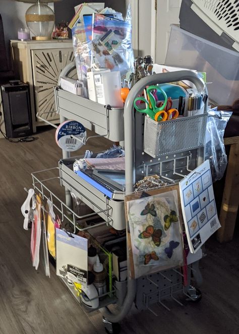 I'm loving how much this little cart can hold.  Regular pegboard hooks work with this so you can add to it. There's even a Cricut Joy is on it. Happy crafting! Junk Journal Supplies Organization, Junk Room Organization, Journal Supplies Organization, Supply Organization, Art Shed, Art Supply Organization, Junk Journal Supplies, Rolling Cart, Journal Supplies