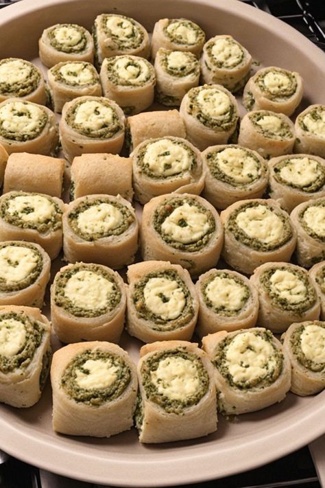 Pesto Feta Rolls Recipe

Ingredients

- 1 sheet of puff pastry (thawed)
- 1/2 cup pesto sauce
- 1 cup feta cheese, crumbled
- 1/4 cup grated Parmesan cheese
- 1 egg (beaten for egg wash)
- Salt and pepper to taste

Full Cooking Instructions on... Pesto Feta Rolls, Pesto Puff Pastry Pinwheel, Pesto Pinwheels Puff Pastry, Spinach And Feta Sausage Rolls, Spinach And Feta Pastry Rolls, Feta Rolls, Turkey Pasta, Cottage Cheese Pancakes, Salisbury Steak Recipes