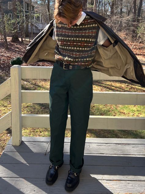 masculine person wearing a sweater vest and dark green dickies pants and black loafers Masculine Vintage Outfit, Academia Outfits Masculine, Queer Preppy Style, Masculine Sweater Outfit, Fem Masculine Outfits Men, Soft Academia Aesthetic Outfits Men, Cottagecore Outfits Masculine, Cottage Core Outfits Masc, Masc Academia Outfits