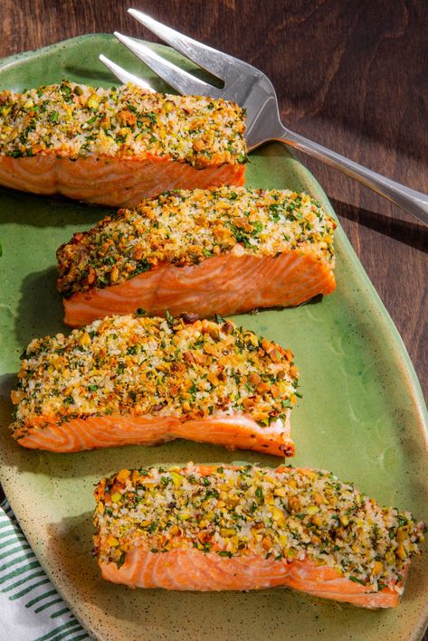 An air fryer helps to produce tender, moist salmon fillets in just 8 to 10 minutes. A layer of tangy Greek yogurt helps the topping of pistachios, fennel seeds, panko, and parsley to stick to the fish. Crusted Salmon Air Fryer, Salmon Air Fryer Recipes, Salmon Air Fryer, Pistachio Crusted Salmon, Herb Salmon, Brown Recipe, Steamed Asparagus, America's Test Kitchen Recipes, Crusted Salmon